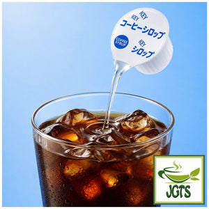 Key Coffee Non-Calorie Sugar Syrup - Pouring coffee sugar syrup into a glass of iced coffee
