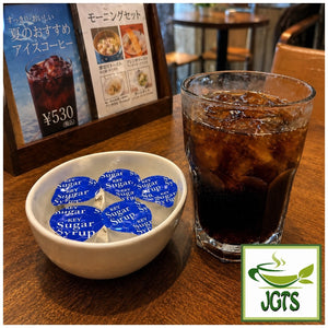 (Key Coffee) - Sugar Syrup - Dish of syrup at a coffee shop
