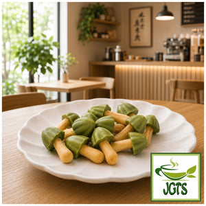 Meiji Kinoko No Yama Uji Matcha Chocolate (Box) - Matcha chocolate crackers on plate