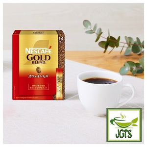 Nescafe Gold Blend Black Caffeineless Instant Coffee - Box and cup of coffee