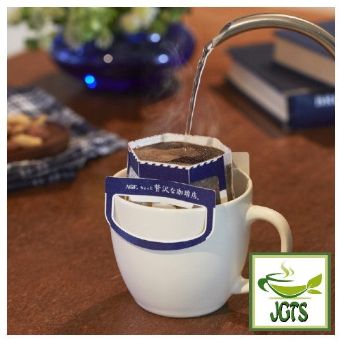 AGF Luxurious Coffee Shop Premium Drip Decaffeinated - Filter packet on cup, hot