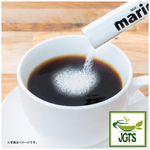 AGF Marim Creaming Coffee Milk 15 Sticks - Individual stick poured in cup