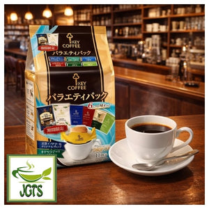 Key Coffee Drip On Variety Pack - Package and cup of brewed coffee at coffee shop