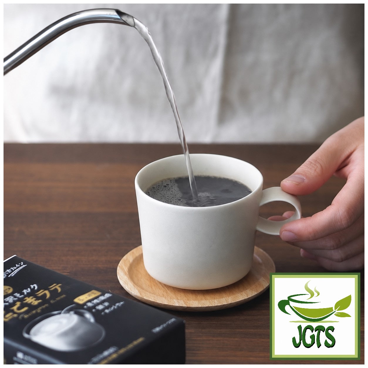 Kuki Sangyo . Kuro Goma (Black Sesame) Latte (4 Pack) - hot water pour in cup