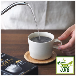 Kuki Sangyo . Kuro Goma (Black Sesame) Latte (4 Pack) - hot water pour in cup