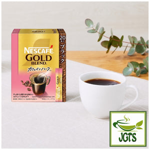 Nescafe Gold Blend Black Caffeine Half Instant Coffee - Box and one cup