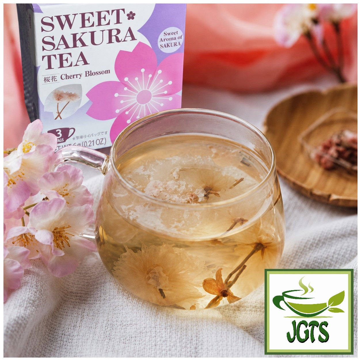 Tea Boutique - Sweet Sakura Cherry Blossom Tea - Cherry blossoms tea in glass cup